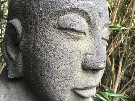 A Buddha sculpture in the garden